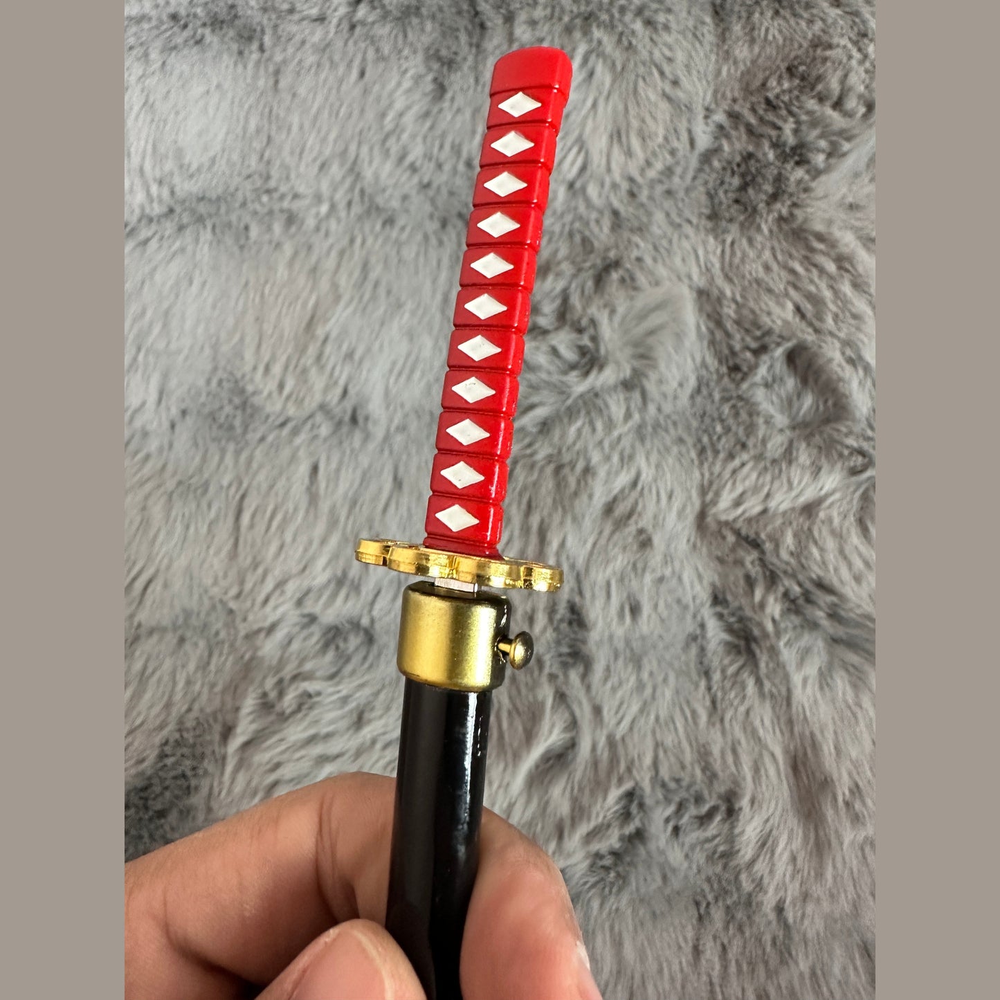 The Demonslayer and One Piece swords with pin control