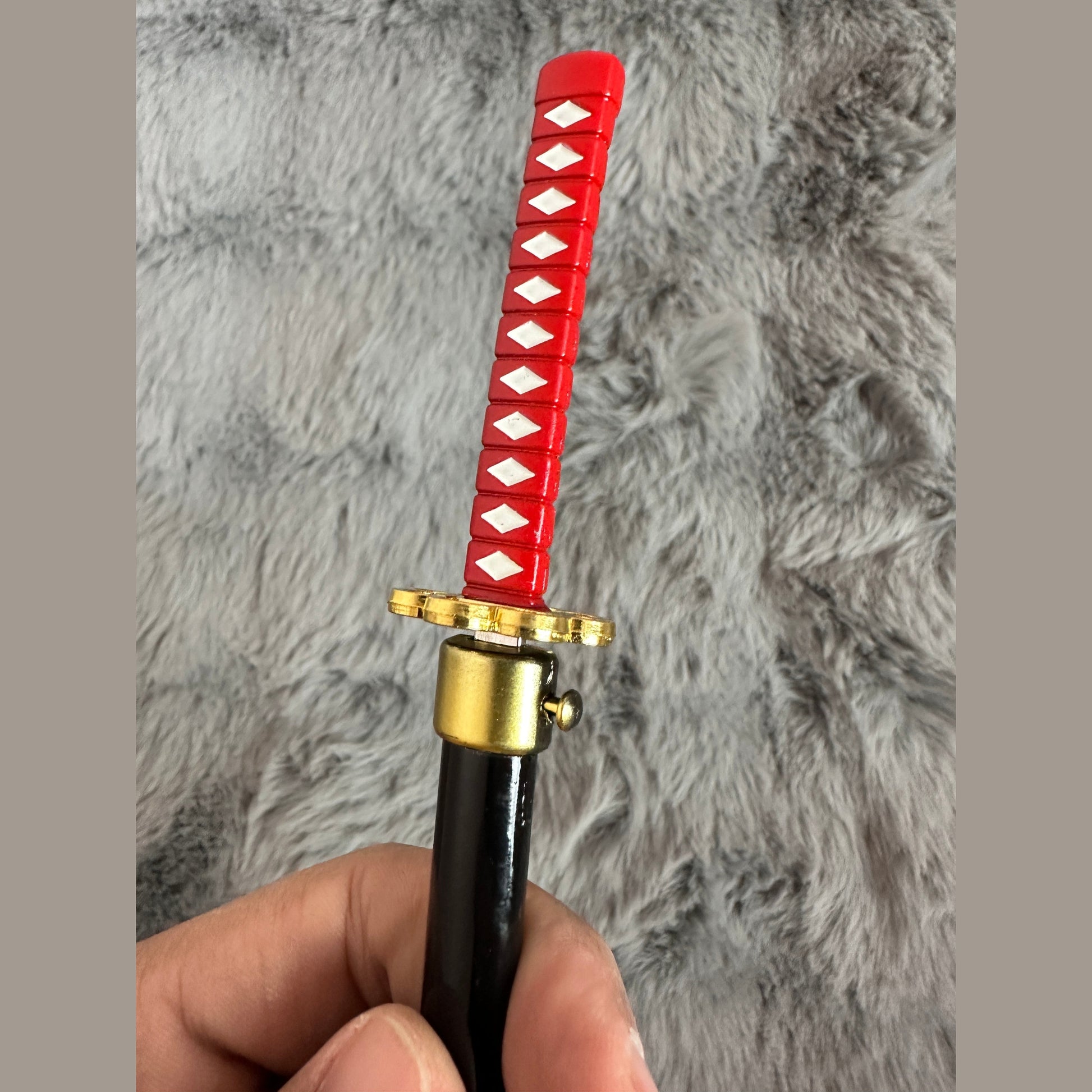 The Demonslayer and One Piece swords with pin control