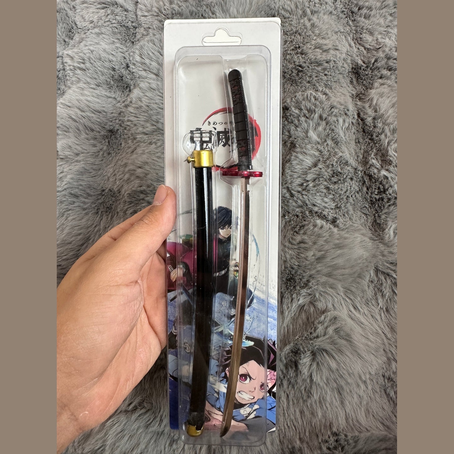 The Demonslayer and One Piece swords with pin control