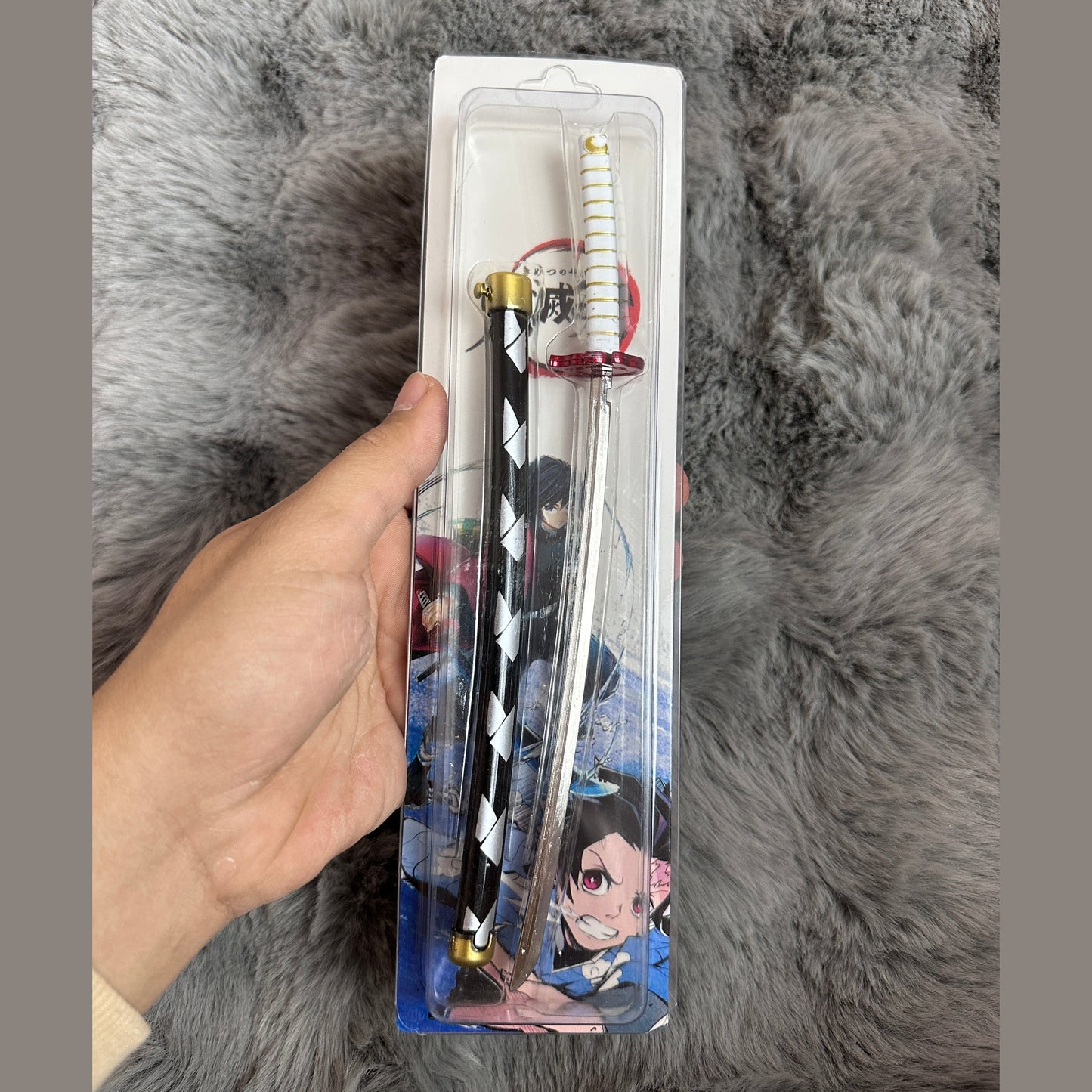 The Demonslayer and One Piece swords with pin control