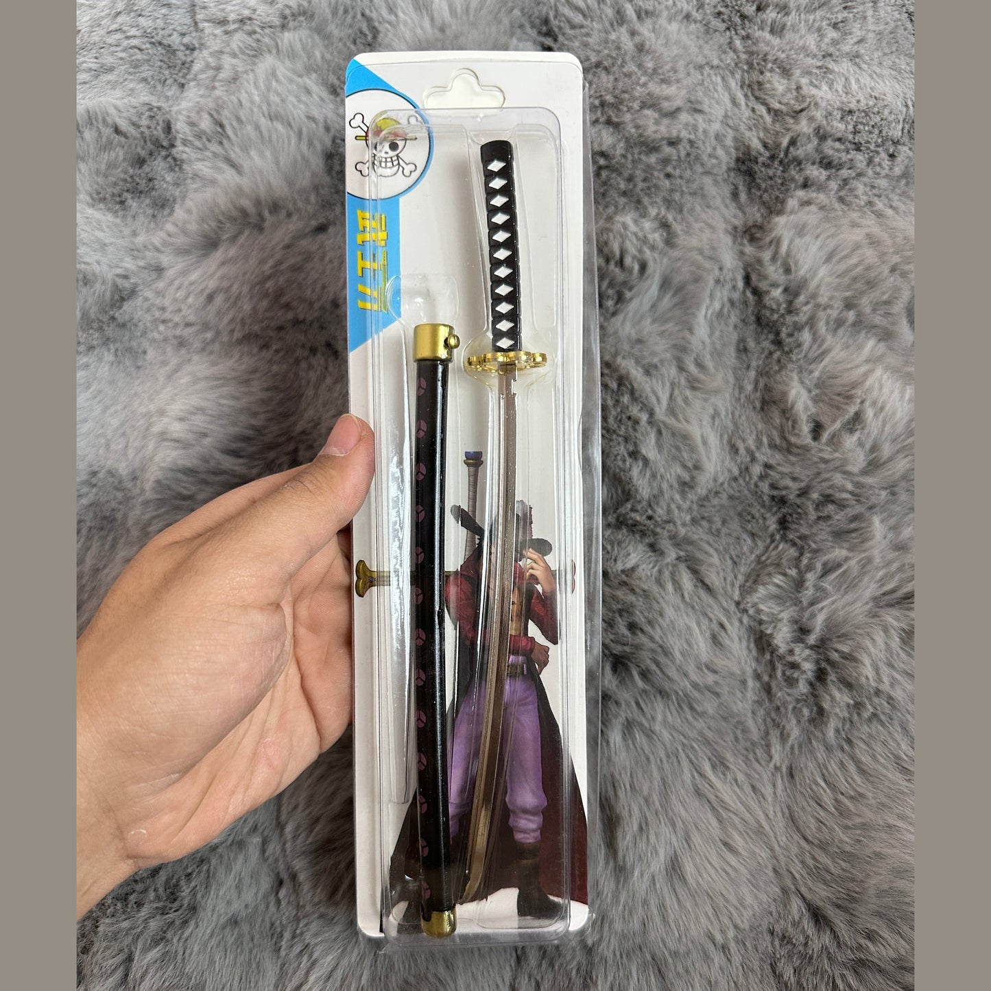 The Demonslayer and One Piece swords with pin control