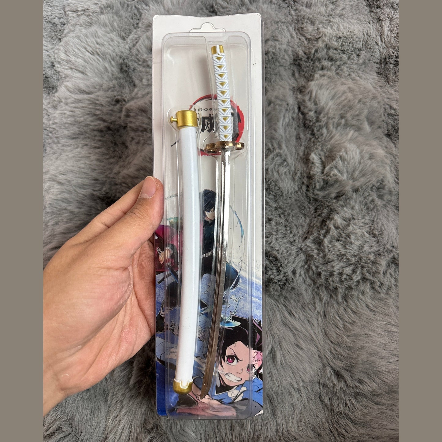 The Demonslayer and One Piece swords with pin control