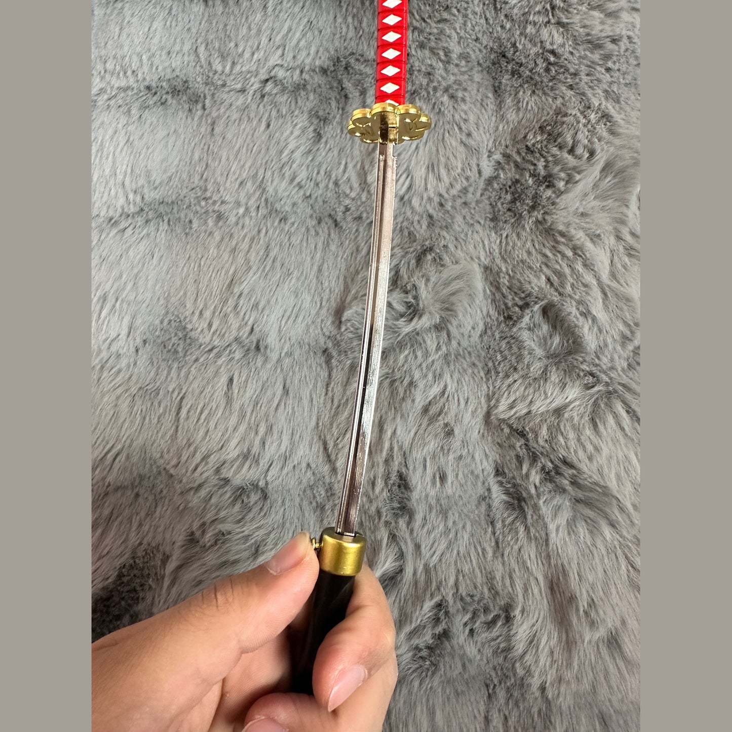 The Demonslayer and One Piece swords with pin control